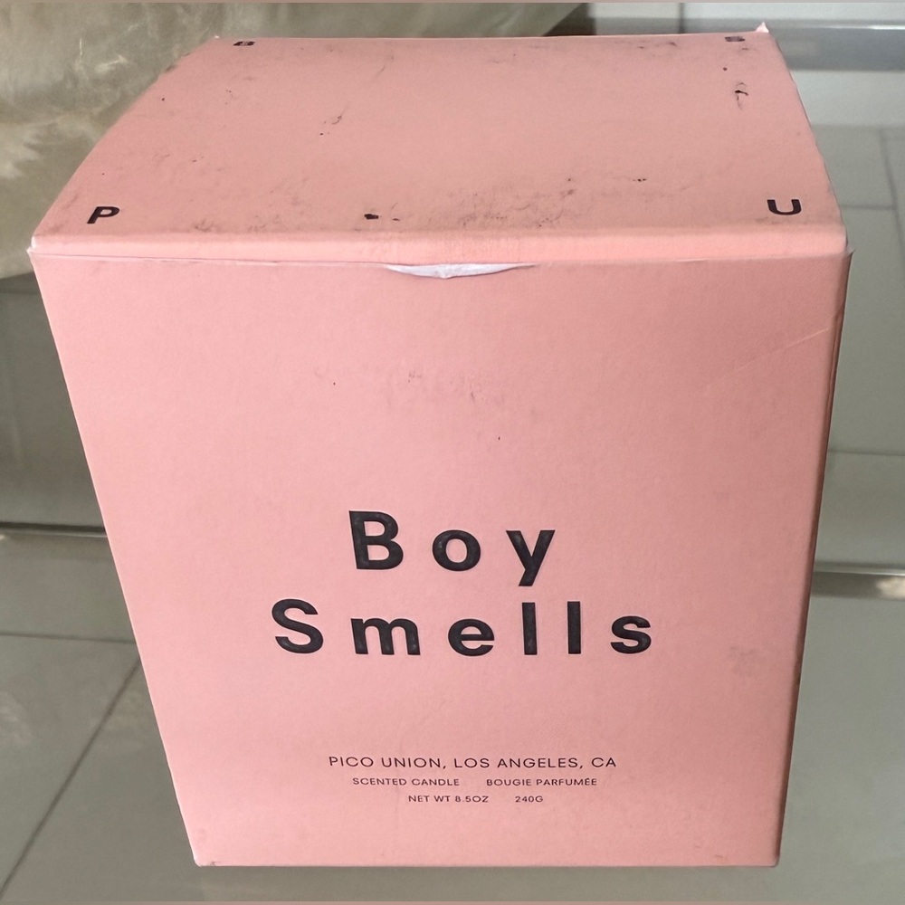 Boy Smells Candle - Picture 3 of 9